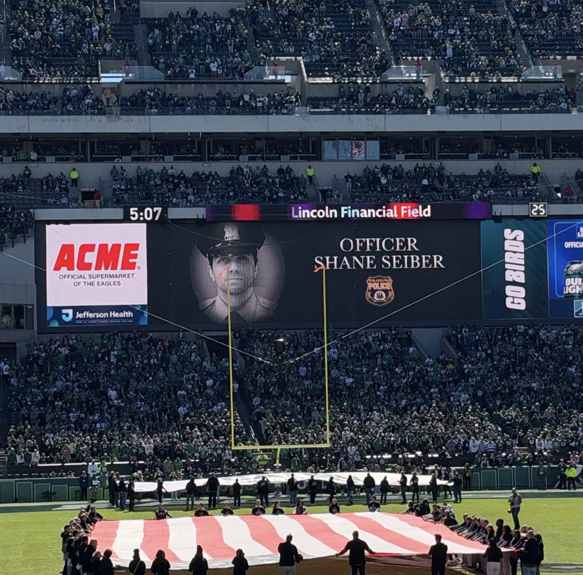 greg_price11's tweet photo. The Eagles honored fallen Philadelphia Police Officer Shane Seiber before the game today.

Officer Seiber was killed by a career criminal who admitted to shooting him because he was white. https://t.co/Iu09w8OxoD