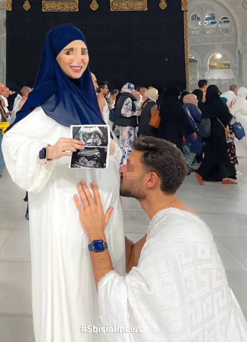 MiddleEast_24's tweet photo. Muslim Couple Sparks Controversy After Husband Kisses Pregnant Wife's Belly Near Kaaba

A photograph circulating today shows a man kissing his pregnant wife's belly inside the Grand Mosque in Mecca, with the Kaaba in the background.

The image has sparked debate over whether such a personal gesture is appropriate at Islam's holiest site, with critics questioning its suitability in a place of worship.