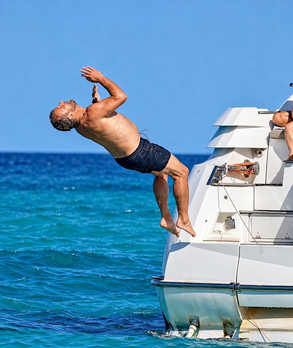 Thompsonbbiz's tweet photo. FC barcelona head coach hansi flick enjoys a day vacation on a yacht https://t.co/TbmT2g7aBT