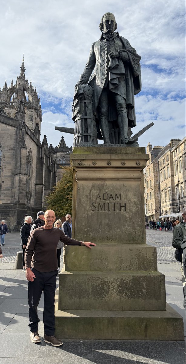 PortfolioGuide's tweet photo. As an economics student 30 years ago, my eyes were opened to free markets &amp; the “invisible hand”. Standing at Adam Smith’s monument in Edinburgh, I learned the father of modern economics was proudly Scottish.

“Great ambition is the passion of great character.”
-Adam Smith https://t.co/GeRHIKIYlv