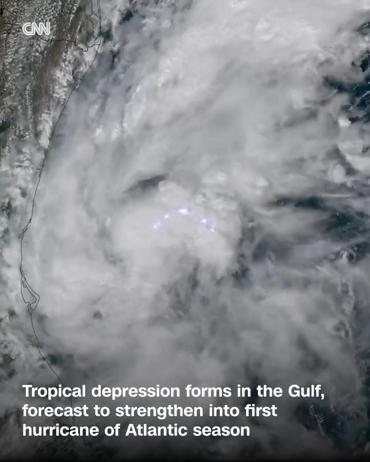 A CNN satellite image shows a swirling tropical depression forming in the Gulf of Mexico near the U.S. coastline, with lightning visible within the storm system. The overlaid text reads, "Tropical depression forms in the Gulf, forecast to strengthen into first hurricane of Atlantic season," which aligns with the post's report about the storm potentially becoming Hurricane Isaias and threatening the southern U.S.