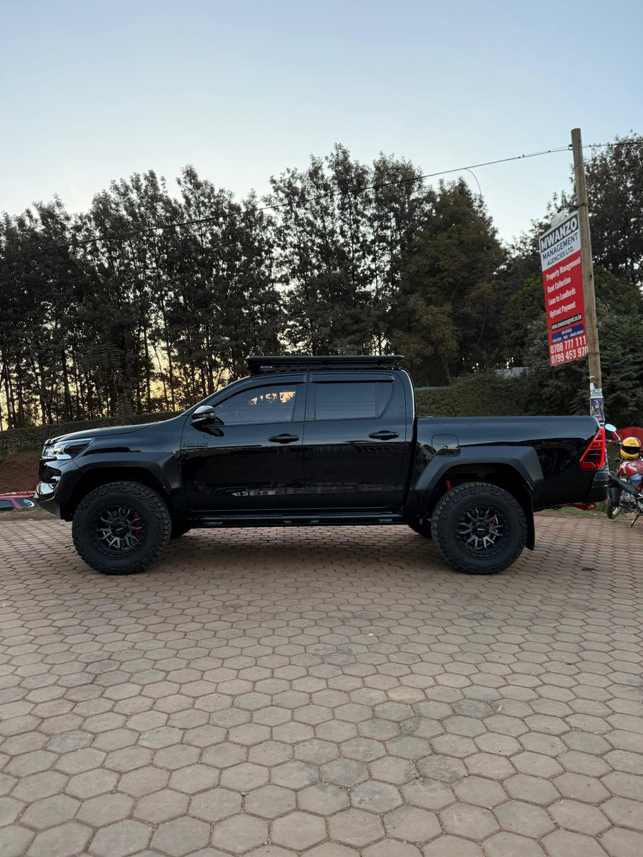 JaMtoka's tweet photo. - 2023 Toyota Hilux GR Sport 🇯🇵 (GUN126R)
- KSh8.95 Million
- Fuel Tank: 80L
- 9-12km/litre
- Payload: 780kg
- Mileage: 26,608km
- Location: Nairobi 🇰🇪
- +254733665551 (WhatsApp)

- 2.8-litre 4-Cyl Turbocharged Diesel with Common-Rail Direct Injection and Intercooler, DOHC 16-valve (1GD-FTV)
- 224bhp @ 3000 rpm
- 550Nm @ 1600-2800 rpm
- 6 Speed AT with ECO and PWR Modes + Paddle Shifters (AC60F)
- Part-time 4WD with Dual-Range (2H/4H/4L) and Rear Differential Lock

- Suspension:
√ Front: Independent Double-Wishbone with Coil Springs and KYB Monotube Dampers — Wider Track +135mm Front and +155mm Rear Versus Standard Hilux
√ Rear: Leaf Springs with Monotube Dampers — Rear Stabiliser removed for Extra Travel, Ride Height Raised by 15mm
√ Brakes: Ventilated Discs All Around — Front 4-Piston Fixed Calipers; Rear Single-Piston (Painted Calipers)
√ Tyres: 265/65R17
√ Ground Clearance: 265mm

- 7 Airbags
- 360° Camera
- Adaptive Cruise Control
- Automatic LED Headlights with LED DRLs and LED Fog Lights
- Brake Assist
- Downhill Assist Control
- Electronic Brakeforce Distribution
- Front and Rear Parking Sensors
- Hill Start Assist
- Traction Control System
- Trailer Sway Control
- Vehicle Stability Control
- Toyota Safety Sense:
√ Autonomous Emergency Braking — Pedestrian Day/Night, Cyclist Daytime
√ Lane Departure Alert with Steering Assist
√ Road Sign Recognition
√ Blind Spot Monitoring
√ Rear Cross Traffic Alert

- 8" Toyota Infotainment Touchscreen Display
- Aux Input
- Automatic Dual-Zone Climate Control with Rear Vents
- Bluetooth Connectivity
- Digital Radio
- Satellite Navigation
- Voice Recognition
- Wired Apple CarPlay and Android Auto
- 1X USB-A Port
- 1X 12V Socket + 230V Outlet in the Centre Console
- 9-Speaker JBL Premium Sound System
- 350W

- 17" Alloy Rims
- ½ Leather  Sports Seats with Red Accents (Heated Front and Power Driver's)
- Ambient Door Panel Lighting
- Aluminium Pedals
- Blacked-out Accents
- Electric Rolling Shutter
- Keyless Entry/Start
- Reinforced Rock Sliders
- Red Seatbelts
- Roof Rack with LED Lights Bar
- Skid Plate
- Wing Mirror Blinkers
