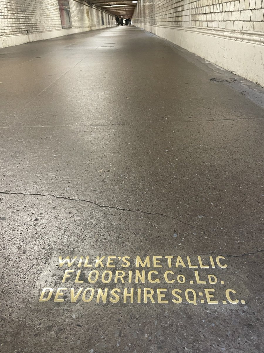 JonathanRhind1's tweet photo. The amazing late 19thC metallic pavement - still sound, smooth, solid after thousands, millions, billions of feet walking over it for the last 150 or so years - on the underpass from South Kensington tube station to the V&amp;A, Science and Natural History Museums #craftsmanship https://t.co/xQH51wzt0W