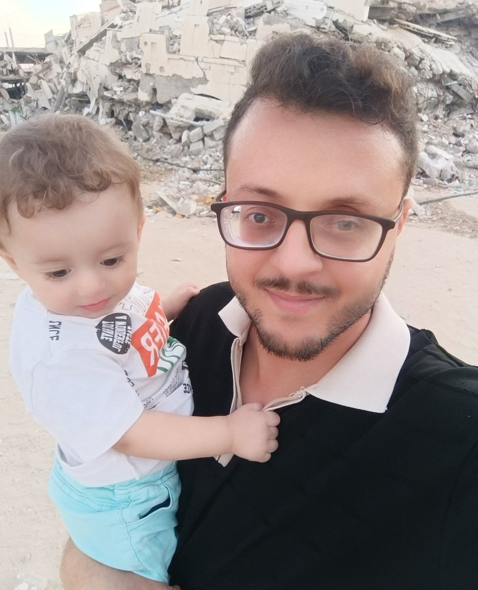ahmedshameya995's tweet photo. My son and i between the rubble in Gaza. 

If you see this post, please repost and reply with 🍉 
 https://t.co/o02gULQLd7 https://t.co/xhx8CWO94Y