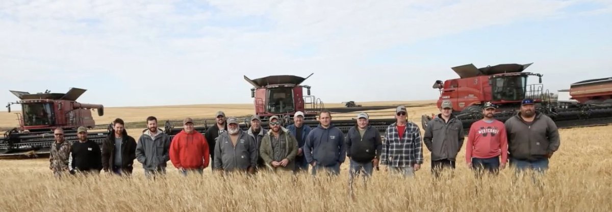 FinalTelegraph's tweet photo. True Story:

On the afternoon of September 9, 2020, in the flat expanse of Divide County, North Dakota, a farmer named Lane Unhjem was racing the autumn frost. In the northern plains, the harvest window for wheat and durum is razor-thin; a single heavy rain or an early prairie freeze can wipe out an entire year of labor and investment in a matter of hours.

While working his fields outside the small town of Crosby, disaster struck: Lane’s combine suddenly caught fire. In the frantic struggle to battle the blaze and save his equipment, the physical shock triggered a massive heart attack. Lane collapsed in the dirt beside his burning machine. First responders managed to stabilize him before he was airlifted more than one hundred miles south to an intensive care unit in Minot, hovering on the brink of death.

His wife and children rushed to the hospital, living minute by minute in an ICU waiting room, praying for his heart to keep beating. Back home, roughly one thousand acres of golden durum wheat and canola remained standing in the fields. For an independent family farm, leaving a thousand unharvested acres to rot under impending weather means financial ruin.

Word traveled across the country roads that evening. Don Anderson, a longtime neighbor, picked up his phone. He did not organize a committee or wait for an outside relief agency; he simply called a few fellow farmers across the county.

The message was brief: Lane is in Minot fighting for his life, and his crop is still in the dirt.

Harvest is the most stressful, high-stakes week of the entire year for every single grower in North Dakota. Every minute spent away from your own fields is a gamble against the weather. Yet the following morning, just after dawn, the gravel roads leading to the Unhjem homestead began to rumble.

Eleven massive combine harvesters crested the horizon in a single line, accompanied by six heavy grain carts and fifteen 18-wheel semi-trucks. Around sixty neighboring farmers had shut down their own operations, fueled their own rigs out of their own pockets, and driven miles across the prairie to take Lane’s place.

Local women from the surrounding farms and church congregations arrived in pickup trucks loaded with coolers of coffee, ham sandwiches, and hot dishes, setting up an open-air mess station in the bed of a truck to keep the crews running.

The combines dropped their headers into the grain and moved side by side across the amber fields, cutting a half-mile wide swath with every pass. They ran without stopping. As soon as a combine hopper filled, a grain cart pulled alongside on the fly, loaded the grain, and rushed it to waiting semis bound for the local elevator.

In roughly seven hours of relentless, coordinated work, sixty neighbors finished what would have taken Lane weeks to complete on his own. By late afternoon, all one thousand acres were harvested, hauled, and safely in the bins. The fields were swept clean, and the Unhjem family’s livelihood was secured while Lane lay in a medically induced coma.

When news crews later reached out to Don Anderson and the other farmers to ask why men would risk their own harvests for another family, Anderson was almost embarrassed by the attention.

"It's just what you do," he said simply. "Everybody knows the Unhjems. When someone needs help, you don’t think about it. You just show up."

Lane Unhjem survived, woke up in that Minot hospital bed, and returned home to discover that while he was fighting for his pulse, his community had ensured his family wouldn't lose the farm.
