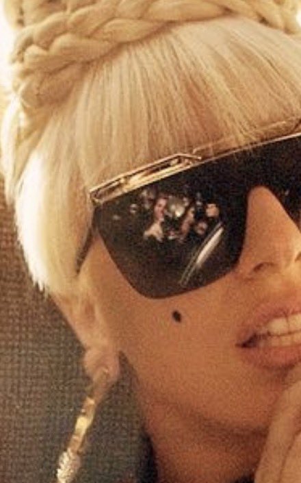 torturedgaga's tweet photo. big fan of this photo and the reflection of paparazzi in her glasses https://t.co/O3aKFzm3xF