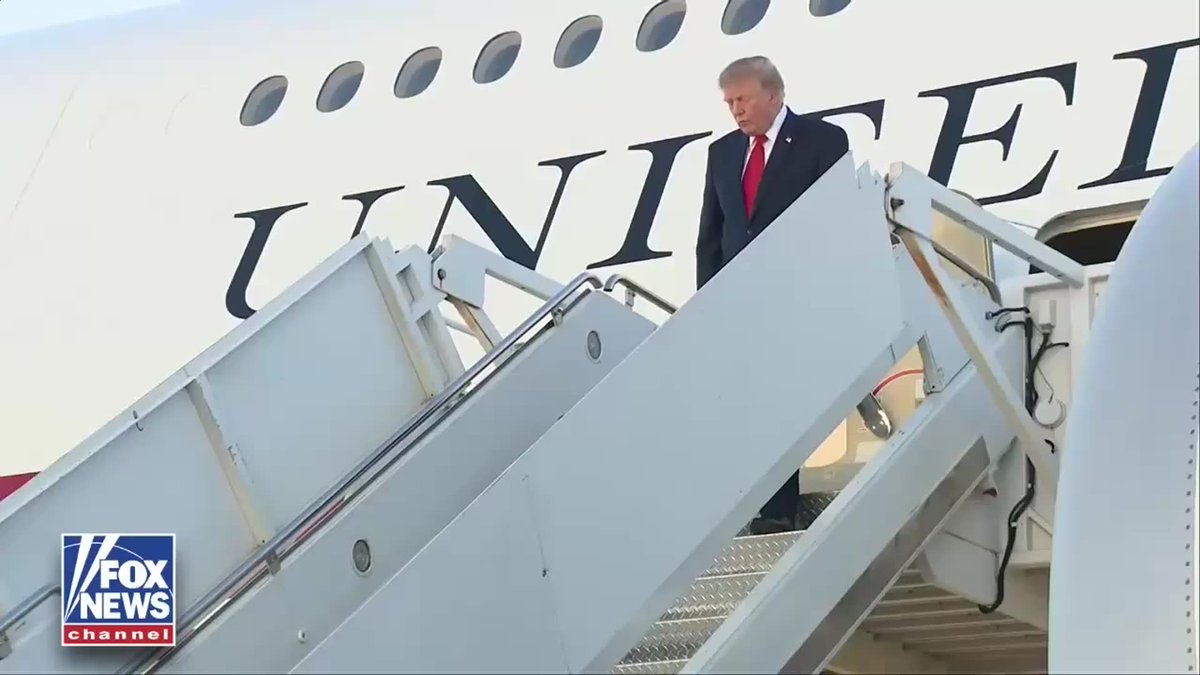 President Trump descends the stairs from Air Force One, with the "UNITED" lettering visible on the fuselage, as he arrives in San Antonio for a campaign rally. The Fox News Channel logo appears in the corner of the broadcast.