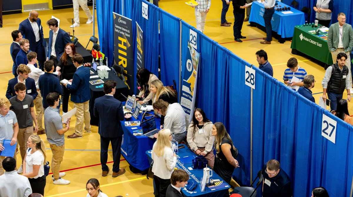 Merrimack's tweet photo. Networking is happening at MC! From internships to full-time opportunities, Warriors had the chance to meet with employers and explore what's possible in their fields at Merrimack's latest career fairs. https://t.co/lx6k1cnLER