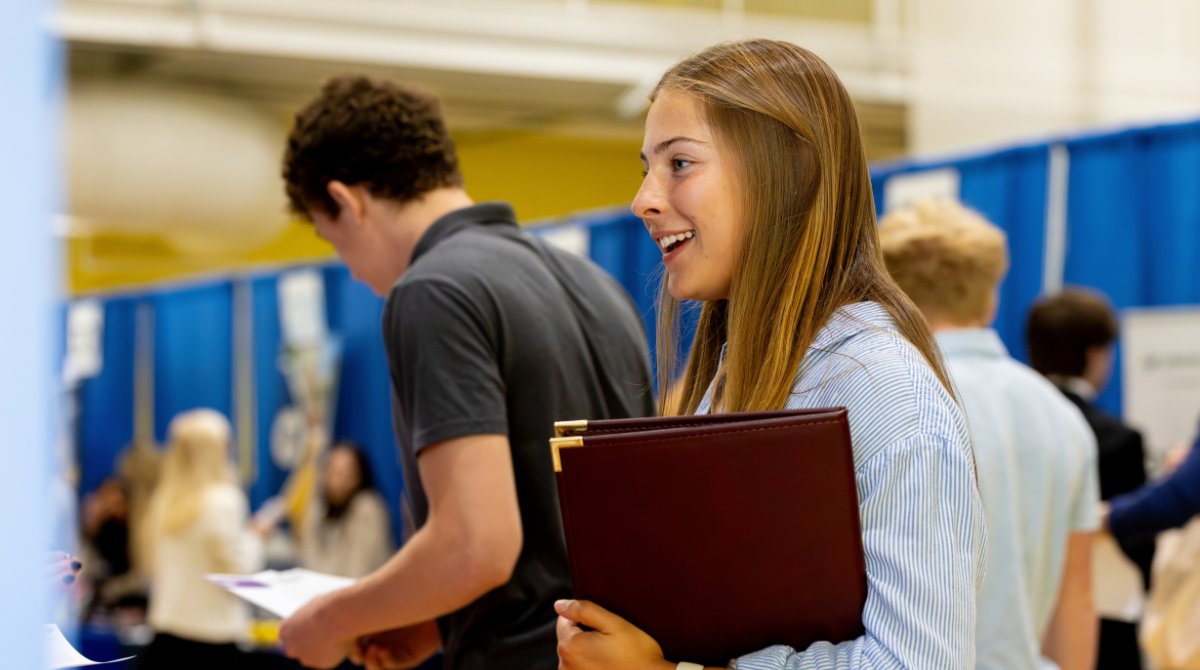 Merrimack's tweet photo. Networking is happening at MC! From internships to full-time opportunities, Warriors had the chance to meet with employers and explore what's possible in their fields at Merrimack's latest career fairs. https://t.co/lx6k1cnLER