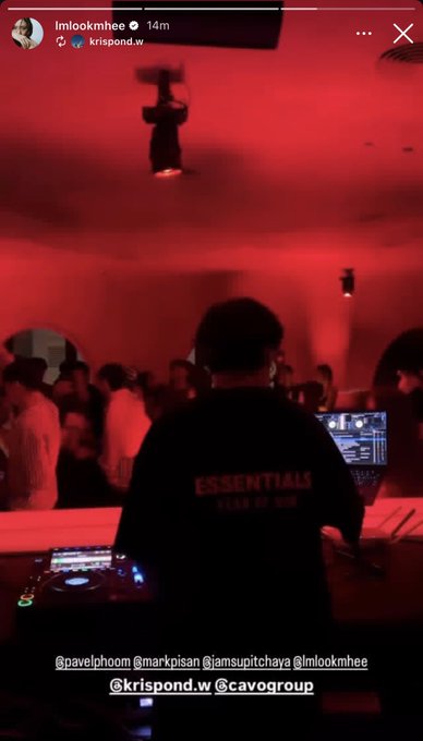 An Instagram story from @imlookmhee showing a DJ in a black 'ESSENTIALS FEAR OF GOD' shirt performing at a red-lit party, tagging @pavelphoom, @markpisan, @jamsupitchaya, and @krispond.w.