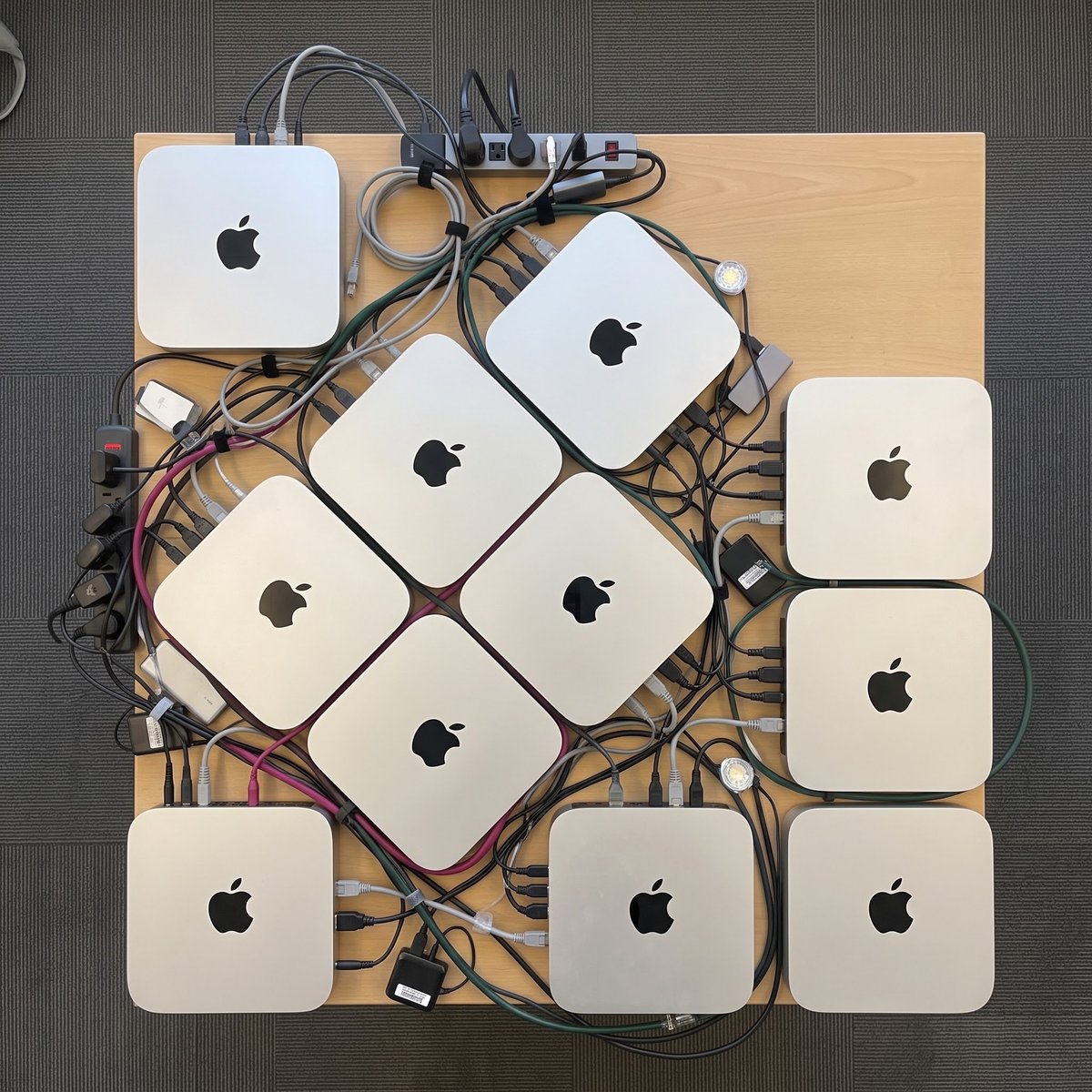 mishig25's tweet photo. thanks to AI assisted math, bought the smallest table that can fit my home cluster of 11 mac minis

using AI to do more AI https://t.co/SLFEPVCj1s