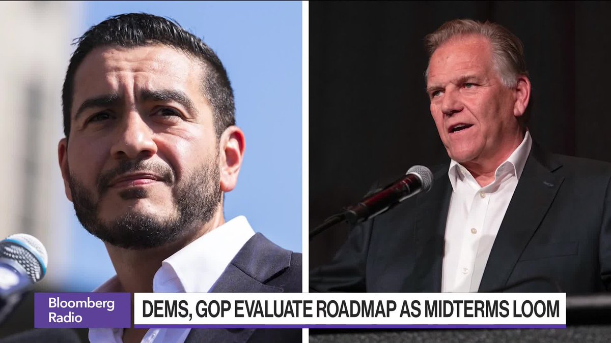 A Bloomberg Radio segment titled "DEMS, GOP EVALUATE ROADMAP AS MIDTERMS LOOM" features a split-screen image of two men at microphones, likely Democratic and Republican political figures being discussed in the context of the upcoming midterm elections in Michigan.