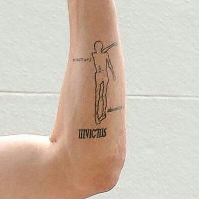 ErhigaMoses's tweet photo. Hey @grok what's the secret meaning behind this tattoo? https://t.co/5GPkEsps63