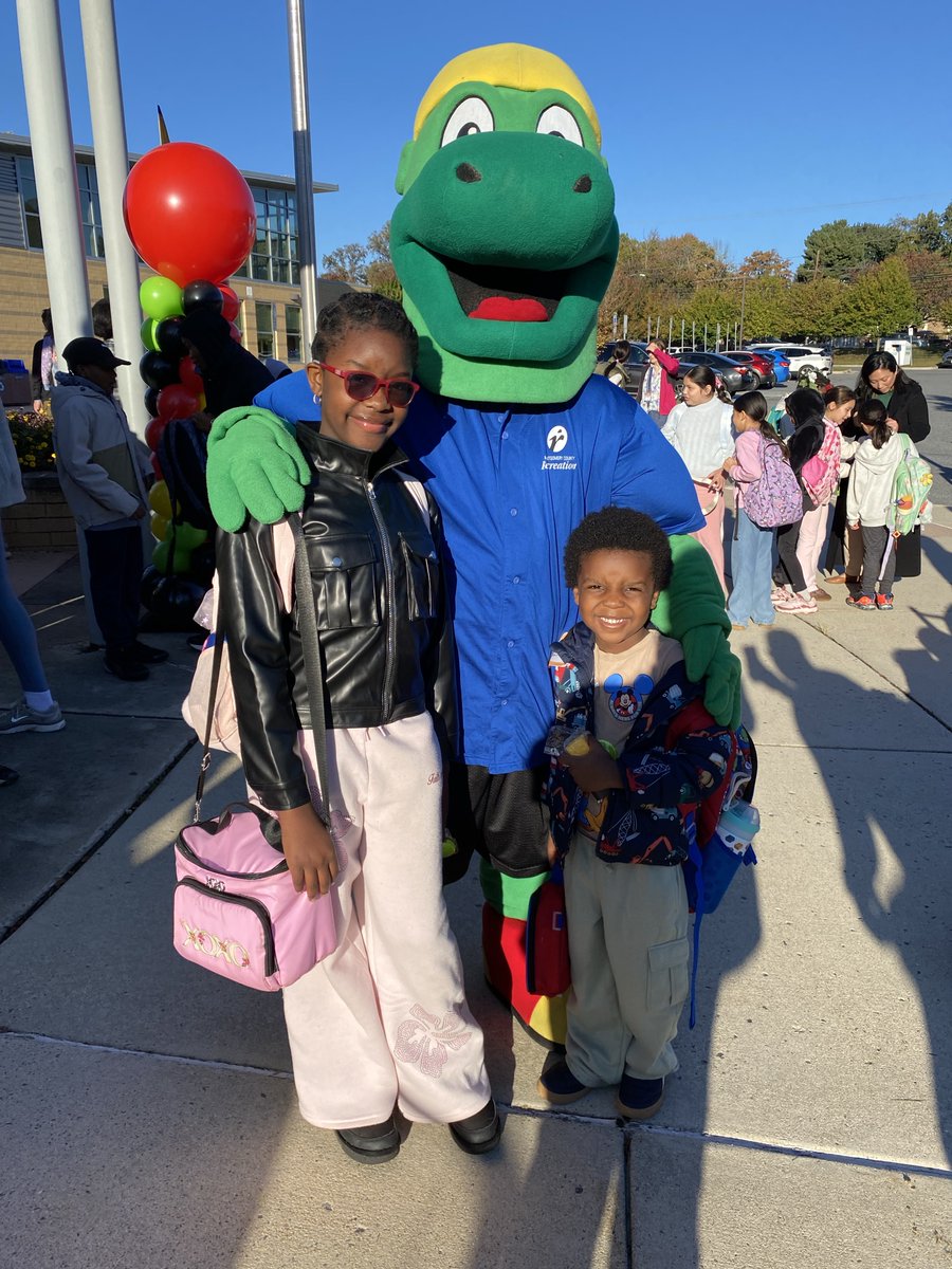 MoCoRec's tweet photo. Our very own T-Rec had an awesome time today joining @MCDOTNow's Zeal the safety Zebra, @mcfrs' Sparky and countless excited students at Walk &amp; Roll to School Day at Glenallan Elementary School to help promote safe travel! 🏫 #MoCoRec @MCPS https://t.co/32YoQrEcKR