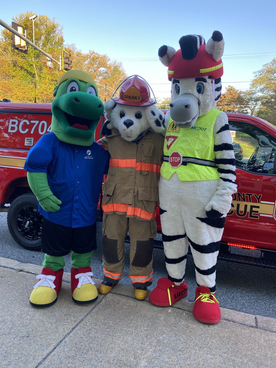 MoCoRec's tweet photo. Our very own T-Rec had an awesome time today joining @MCDOTNow's Zeal the safety Zebra, @mcfrs' Sparky and countless excited students at Walk &amp; Roll to School Day at Glenallan Elementary School to help promote safe travel! 🏫 #MoCoRec @MCPS https://t.co/32YoQrEcKR