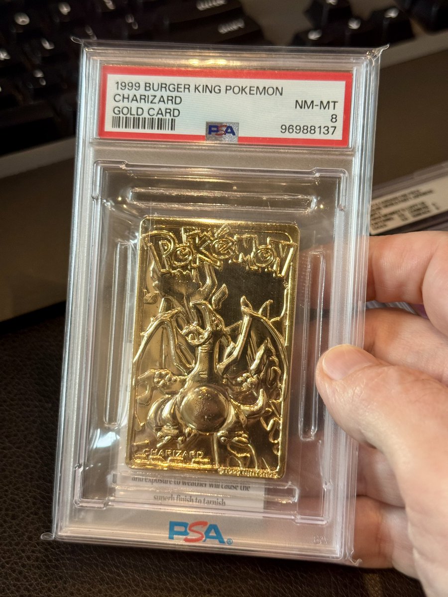 urbanmedium's tweet photo. With all these vintage alt-Pokémon cards pumping, when does the 1999 Burger King “23k Gold” Charizard get its due? PSA literally had to design a custom slab for it, and after the holder scratched the other character cards, they stopped grading the rest. PSA 10 pop: 0. 👑 https://t.co/CdG2xLUvY9