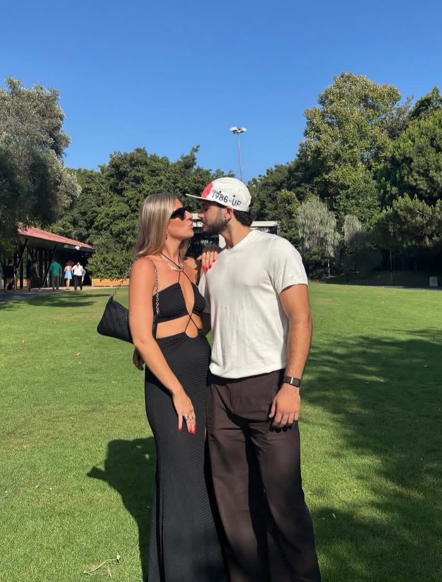HenMazzig's tweet photo. “About two years ago, I started dating someone.

A few days in, she laid out a verbal agreement: a certain number of days each year, she would be with another partner.

We agreed on the days together in advance, and on those days I would need to let her be with him.

She loves him very much.

Honestly, I'd heard about him a few times, and we had even met in the past.

Even before I knew we'd be together under this agreement, I understood her completely.

You can't give up on a guy like that, he's the best there is. Salt of the earth.

On each of those days she goes to him, sits and talks with him, shares her life with him: her work, her successes and her struggles, and also our relationship.

They can sit for hours, talking about the future and the past, about everything they did together and everything she still wants to become.

And me? Well, I usually wait at home. I give her that; it's part of the agreement. Most of the time she's with me, and when she's with me, she's with me one hundred percent.
Every now and then, when we're together, I ask about him: about his career, about their relationship, what there is to learn from him, and how we're different.

Over these years, I've discovered that it doesn't bother me.

I love her, and she loves both of us. It all happens together, completely. One doesn't overshadow the other.

But sometimes I wonder what would have happened if he hadn't been killed. We never would have met. And I wonder whether I'm her blessing, but also part of her curse. Am I doing something wrong, or am I part of the healing?

And this too all lives together, and that's okay.

When we started dating, I told her that in this world, we're in it until the end. And when we go to the next world, I release her to go back to him and pick up where they left off.

And I love her, I love her very much. I love him too.

In memory of Major Benji Trakinsky, who fell in the battle to defend Kibbutz Be'eri on October 7 💔”

-Nevo Dan, translated from Hebrew.