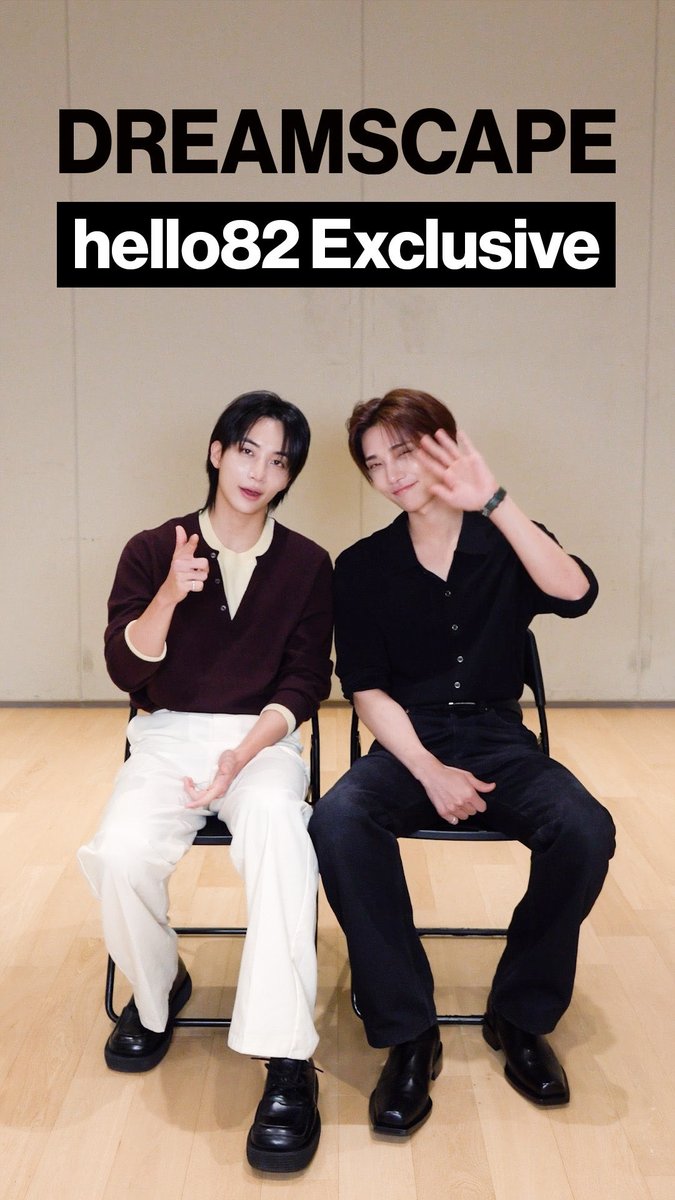 Two young men pose together on black folding chairs, one making a finger heart and the other waving, with the text "DREAMSCAPE" and "hello82 Exclusive" displayed above them in a promotional image for the JxJ 1st Mini Album.
