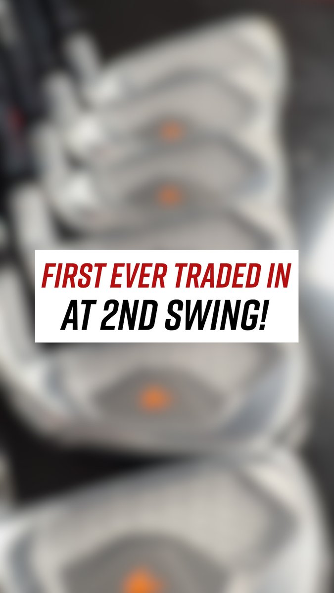 A blurry stock market trading interface with overlaid text stating 'FIRST EVER TRADED IN AT 2ND SWING!'