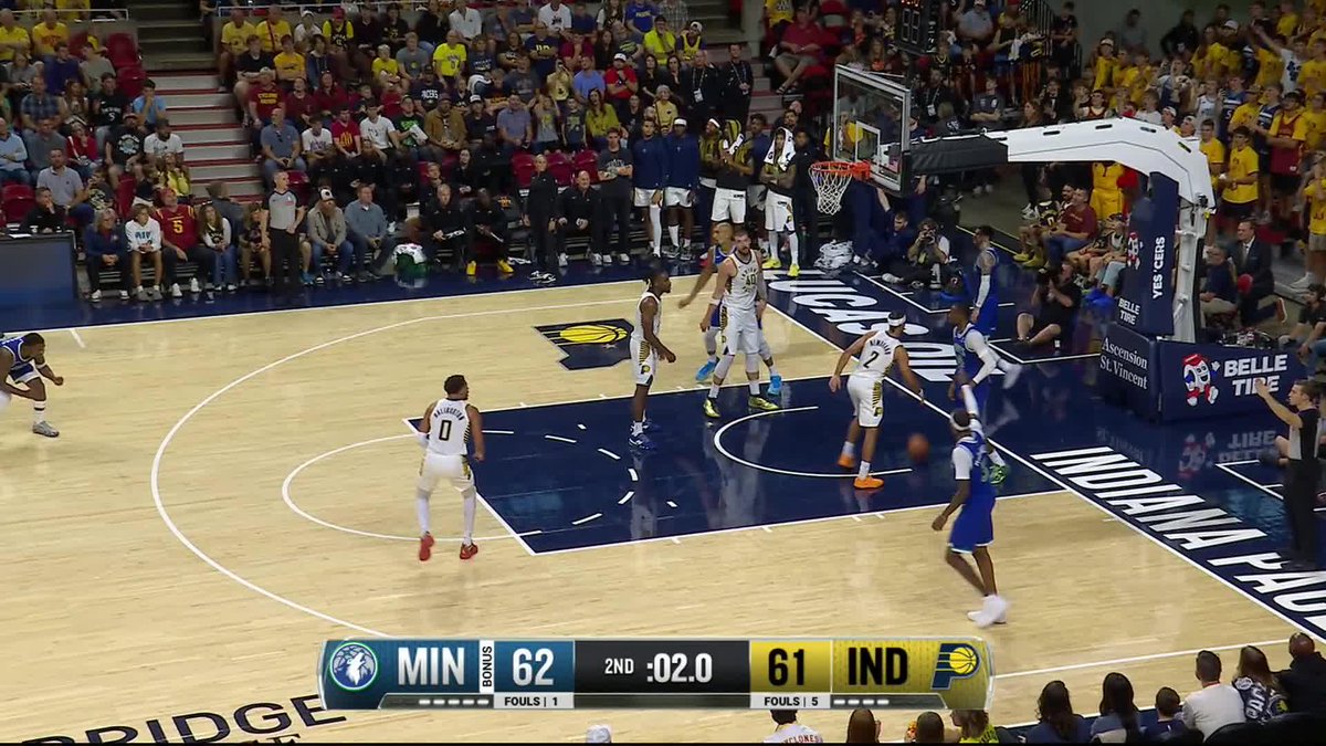 A tense NBA matchup between the Minnesota Timberwolves (62) and Indiana Pacers (61) with just 2.0 seconds left in the 2nd quarter, showing the action on the court as players position themselves near the basket at Gainbridge Fieldhouse. The close score and limited time remaining captures the kind of clutch, high-stakes moment fans should "get used to" watching.