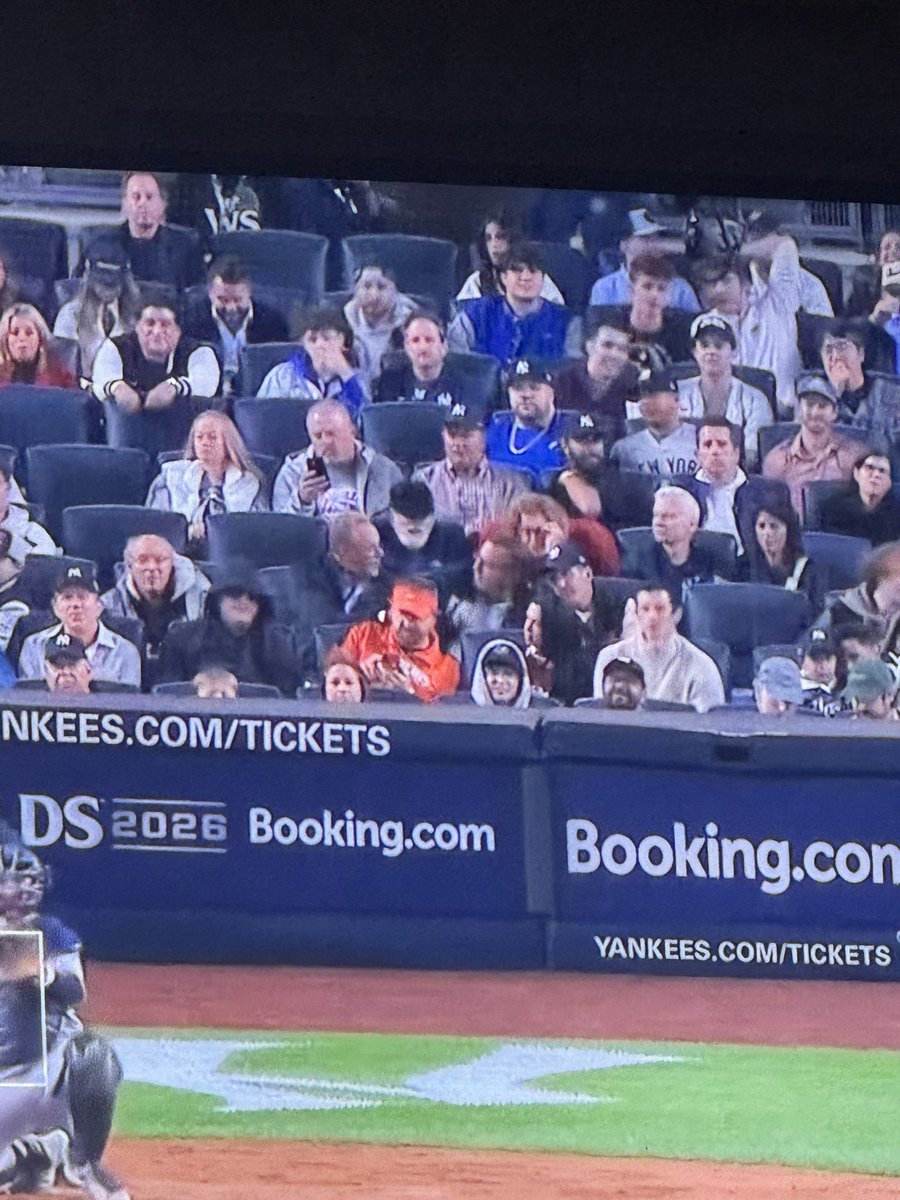 TankShots's tweet photo. I would love to know what Marlins Man is showing Dua Lipa on his phone mid-game 😂 https://t.co/A0UKzNjN0E