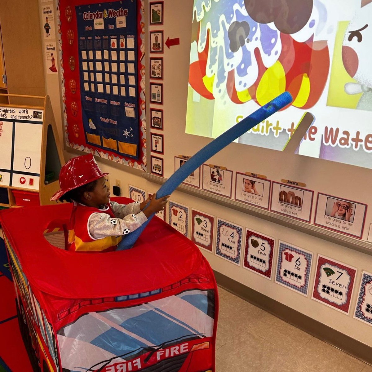EarlyLearningDr's tweet photo. This week, we’ve been learning all about community helpers who use tubes &amp; tunnels. We talked about how firefighters use hoses (tubes) to help put out fires! Then we sang “Hurry, Hurry Drive the Firetruck” each student got a turn to pretend to be a firefighter &amp; put out the fire. https://t.co/Szmyyj4vu1