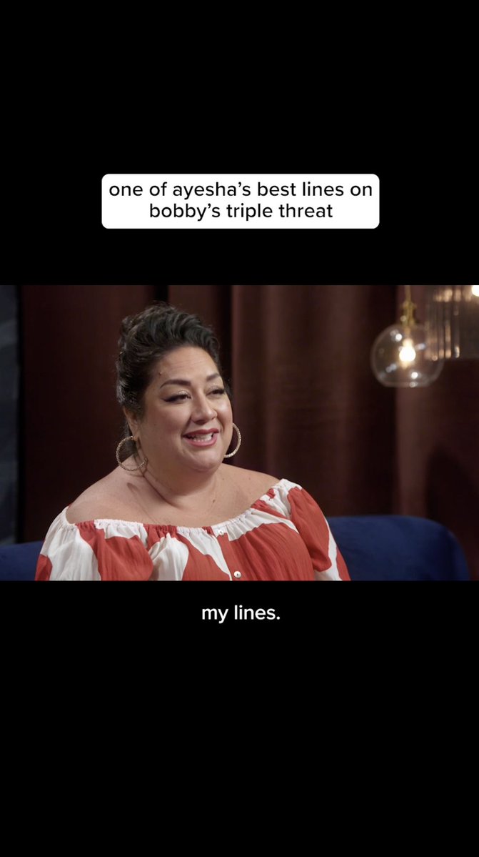 A video screenshot shows a smiling woman in a red and white off-the-shoulder top, with text reading 'one of ayesha's best lines on bobby's triple threat' and 'my lines.'