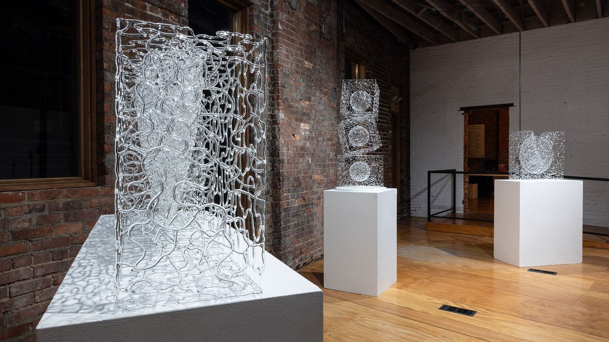 FreshWaterCLE's tweet photo. What can glass do when it’s stripped down to line, light, and form? 👀

Cleveland artist and @cleinstituteart professor emeritus Brent Kee Young explores that question in “A Concept in Flux: The Matrix Series Light • Line • Form • Glass,” now on view at @TheSculptureCenter.

Inspired by everything from exposed tree roots to the steel rebar of a demolished building, Young’s intricate glass forms challenge our perceptions of space, volume, light, and even the fragility of glass.

Read more about Young’s fascinating work and the possibilities he sees in glass. The exhibit is on view through Oct. 31. 

https://t.co/dZ2w5RNstv