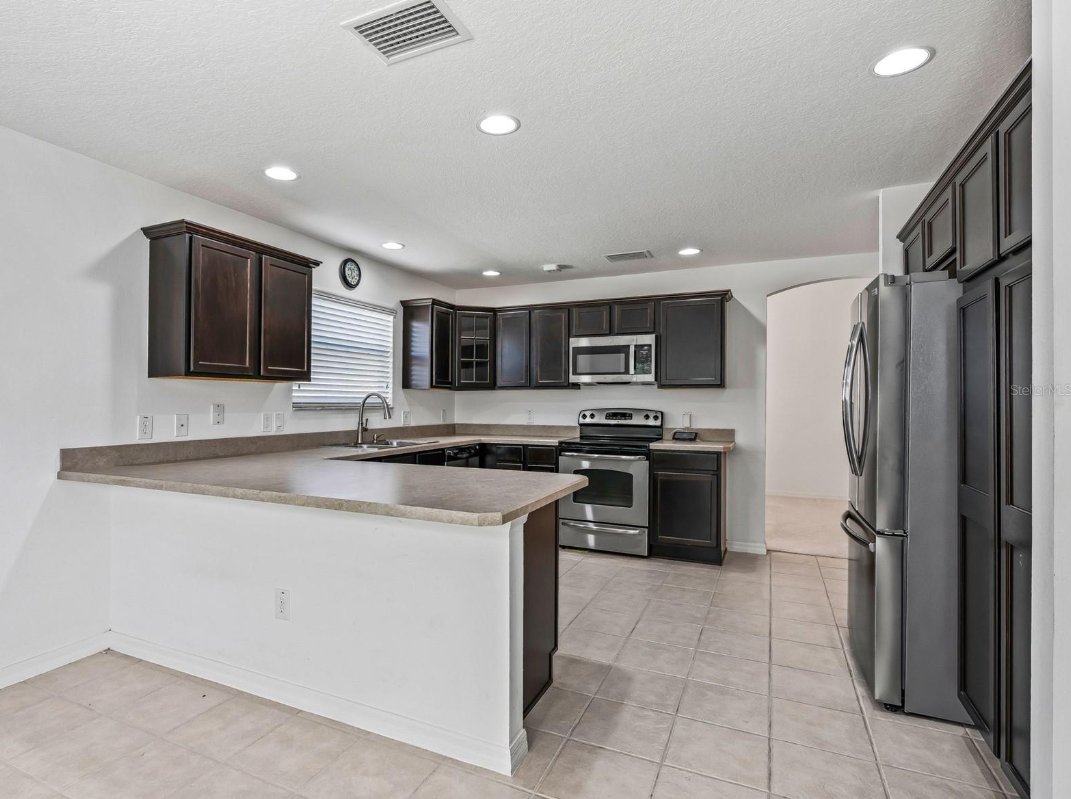 JimmyDMooreJr's tweet photo. OPEN HOUSE TODAY · 10 AM–12 PM
Thursday, October 8
764 Baisley Trail
Village of Bonita | The Villages, FL 32162
Cypress model. Golf cart garage. No rear neighbors.
This 3-bedroom, 2-bath home has the curb appeal first: decorative concrete, manicured landscaping, and the kind of upkeep you notice from the street.
Inside, the open floor plan is made for everyday living and company. The eat-in kitchen has espresso cabinets, stainless appliances, a pantry, and bay windows for morning coffee. It flows into the formal dining room and living area.
The split plan gives guests their own wing — two bedrooms and a full bath behind a pocket door. The primary suite has two walk-in closets, dual sinks, and a tiled walk-in shower.
Out back, the enclosed lanai with vinyl windows looks onto a private yard. No rear neighbors, and mature landscaping along the sides.

Already handled:
New roof to be installed before closing
HVAC 2019
Water heater April 2022
Golf cart garage added in 2012
Omnishield smoke and fire system 2019
Golf, rec centers, pools, pickleball, shopping, dining, and medical are close by.
Come walk through this morning. I’ll show you around.
Need a different time, or want to see something similar? Call me at 352.320.0322
#OpenHouse #TheVillages #TheVillagesFL #VillageOfBonita #CypressModel #GolfCartGarage #FloridaRealEstate #MoveInReady