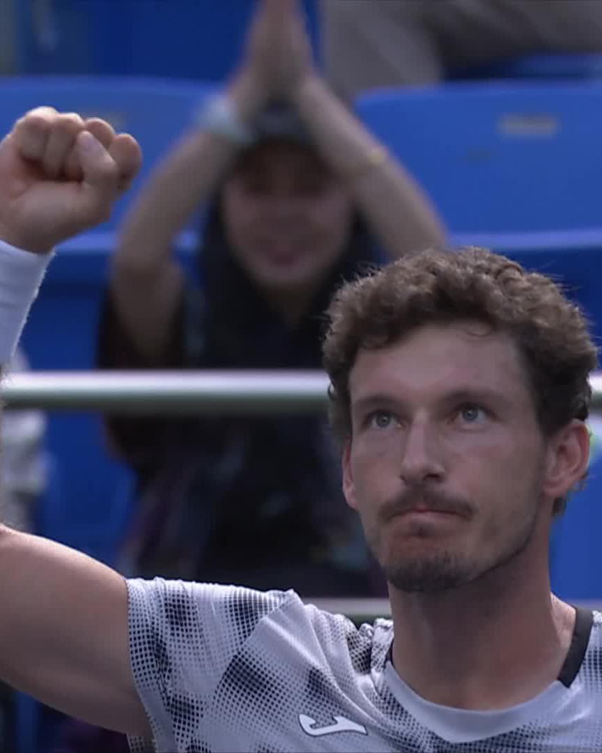 Pablo Carreño raises his fist in triumph, visibly emotional after his impressive comeback victory over Navone—the same player who stunned Djokovic at the US Open—marking his first main draw ATP-level win since Cincinnati.