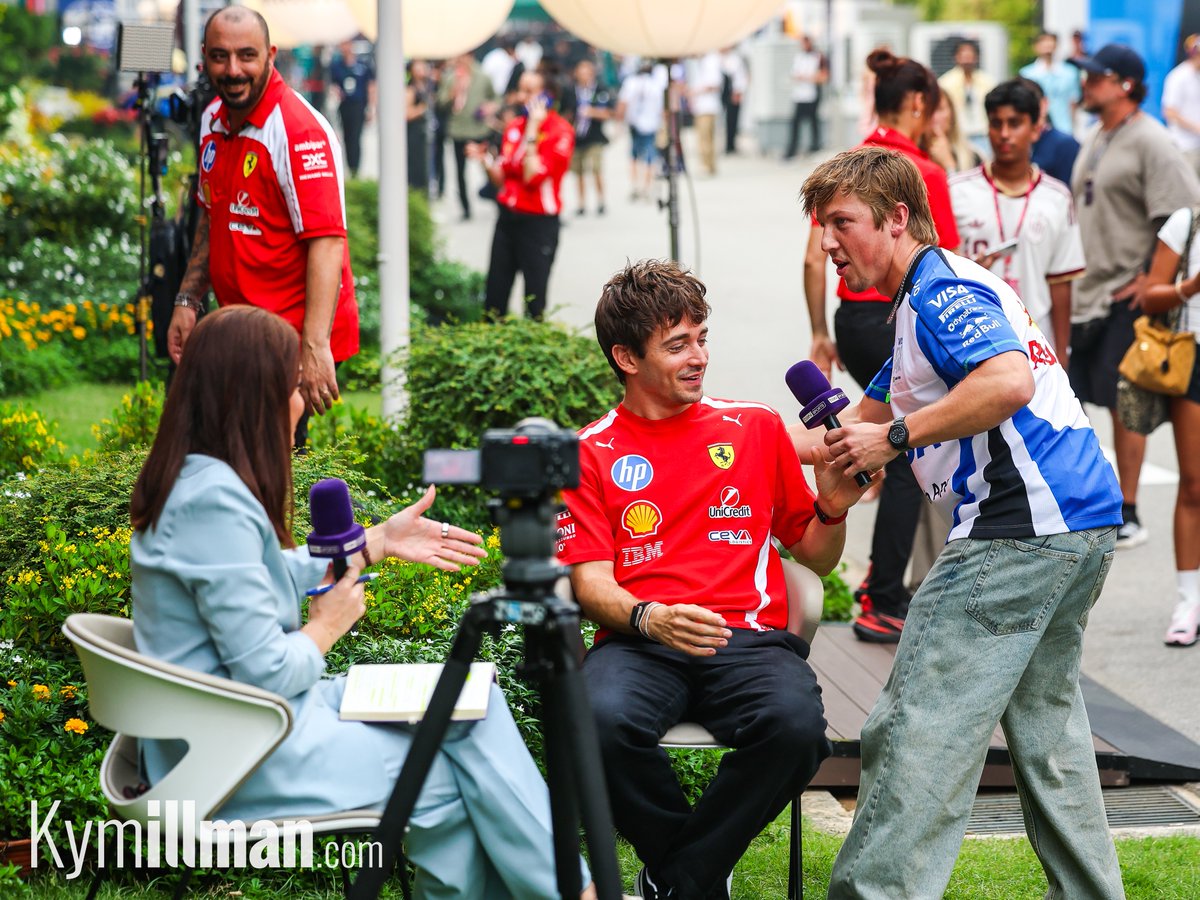 leclercsletters's tweet photo. liam stealing charles' mic during his interview?!?!?!?! what is in the singapore air bro https://t.co/335GS1CFMX