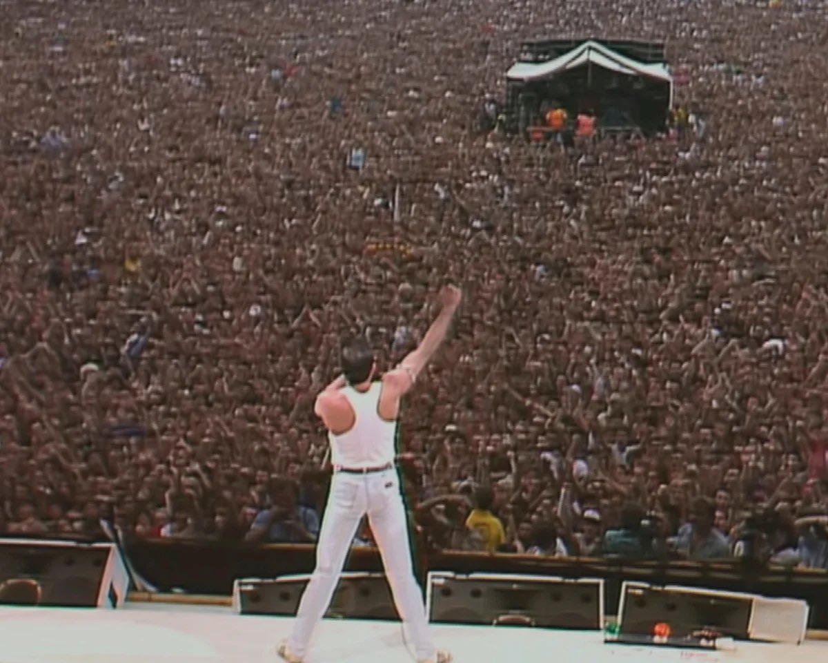 historyrock_'s tweet photo. In 1985, hours before taking the stage at Wembley for Live Aid, doctors warned Freddie Mercury not to sing. 

He had serious vocal problems and even refused to give interviews that morning because of the condition of his throat. Far from heeding their advice, he decided to go on stage with Queen anyway.

The result was a set lasting just 21 minutes that went on to become legendary. Freddie got 72,000 people in the stadium to sing and clap in unison, following his every move, in a display of stage presence that many consider unmatched. 

Two decades later, in 2005, a BBC poll voted that performance the greatest live show in Rock History, ranking it above Jimi Hendrix at Woodstock and even The Rolling Stones’ free concert in Hyde Park.