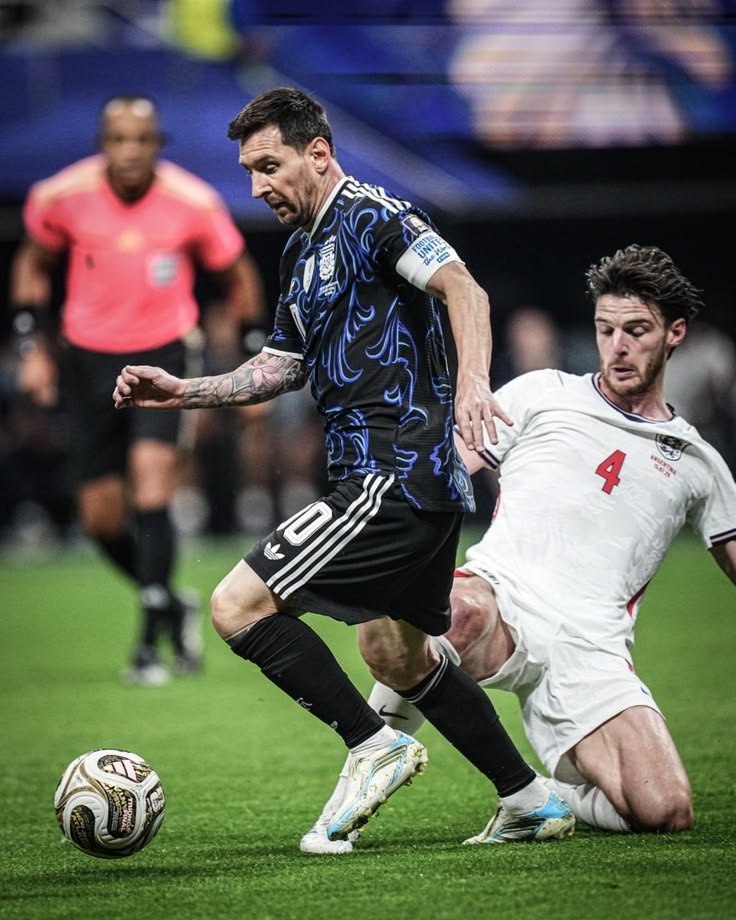 tomisinfcb's tweet photo. 🚨Sir Alex Ferguson on Lionel Messi saying the match against England left them physically and mentally weakened before the final against Spain:

“I understand exactly what Lionel is saying, and I actually think people are missing the point.

When you play a match like England before a final, people only look at the result. They see who won, who scored, who qualified. They don't see what the game takes from you.

A semifinal can take something from a team.

Your legs feel it. Your concentration feels it. Your emotions feel it. And sometimes, even when you win, you arrive at the final carrying things that nobody watching from the outside can see.

That's why I believe Messi when he says that game made them weaker.

People will say, ‘But they won against England, so how can it have hurt them?’

That's football.

You can win a battle and still lose something for the war.

I learned that over many years as a manager. Sometimes you leave a semifinal dressing room celebrating, music playing, players shouting, everybody delighted.

But I would look at them and think, ‘How much have we got left?’

Because the final doesn't care about what you did three days earlier.

The final asks you for everything again.

And Spain were waiting.

That's the part people forget. You don't get to recover emotionally just because you've reached the final. You don't get to tell your body, ‘We need another performance tomorrow, so forget what happened.’

The body doesn't negotiate like that.

And Messi understands these things better than most footballers because he's played at the highest level for so long.

He's felt the difference between arriving at a final fresh and arriving there carrying a semifinal in your legs.

So when Leo says, ‘That game made us weaker,’ I don't hear an excuse.

I hear a footballer explaining something that managers have understood for decades.

The England match may have been a victory.

But victory doesn't always mean you arrive at the next match stronger.

Sometimes you arrive with fewer legs, less energy, less sharpness.

And against a team like Spain, that small difference can become enormous.

That's what makes finals so cruel.

You can prepare for months. You can win the semifinal. You can believe you've done the hardest part.

Then you walk into the final and discover that the hardest part was having enough left to do it all again.

So yes, I believe Messi.

If Lionel Messi tells me his team wasn't the same physically after that England match, I'm not going to sit in a studio and tell him he was wrong.

He was on that pitch.

He felt it.

And sometimes the people who played the match understand the truth of it better than the people who watched it.

That's football.

You don't always lose a final because the other team was better.

Sometimes, you arrive at the final already carrying the weight of the match you had to survive to get there.”