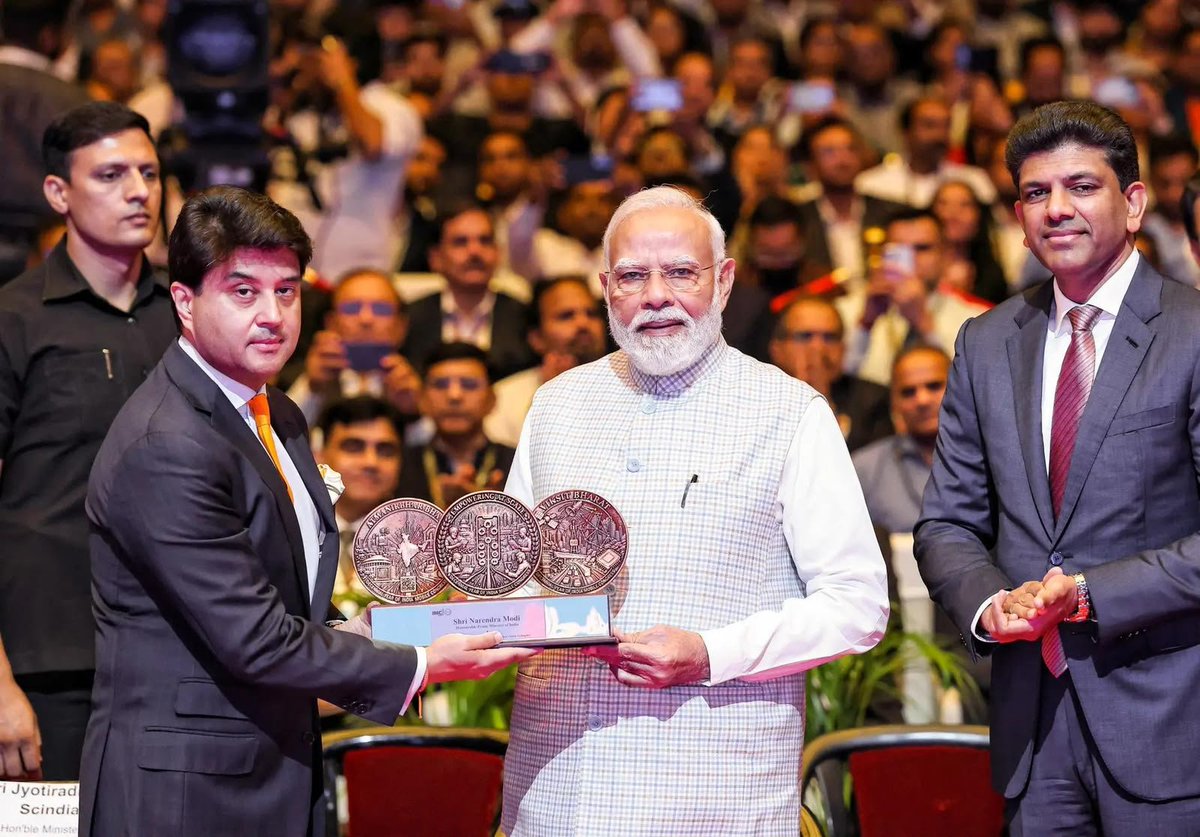 DoT_India's tweet photo. India is ready to #ScaleWithoutBoundaries at #IMC2026! 

The 10th edition of India Mobile Congress, inaugurated by Hon’ble Prime Minister Shri @narendramodi, marks a new chapter in India’s journey towards a connected, innovative and technology-driven future.

From expanding connectivity to driving the next wave of telecom and digital innovation, Bharat is shaping the future of technology.

Know more: https://t.co/mGtpQnH14V

#IndiaMobileCongress #IMC2026 #ScaleWithoutBoundaries #PMatIMC 

@JM_Scindia @PemmasaniOnX @PIB_India @pib_comm @DDNewslive @exploreIMC