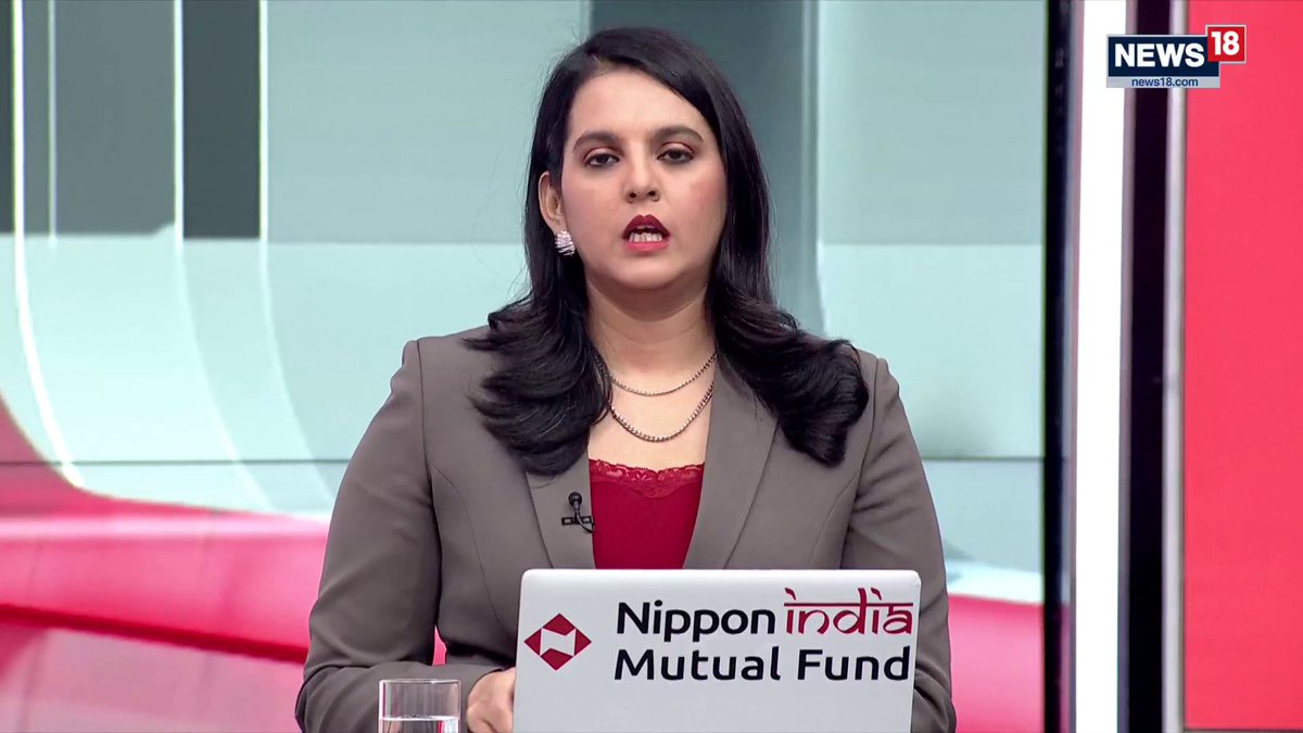 A News18 anchor, identified as @nimumurali, presents on a studio set with a "Nippon India Mutual Fund" branded laptop, delivering coverage of the Madras High Court's FCRA ruling alongside @poonam_burde on #The5PMBrief.