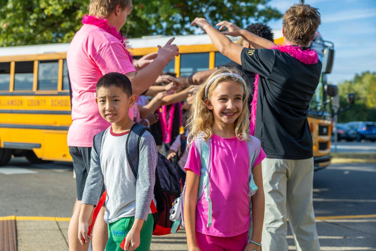 WCSedu's tweet photo. Ravenwood High football players and Rowdy the Raptor helped kick off a fun Friday at Crockett Elementary, welcoming students with high fives before joining a school-wide assembly and friendly competitions! 🏈 https://t.co/S1QQAvDm6a