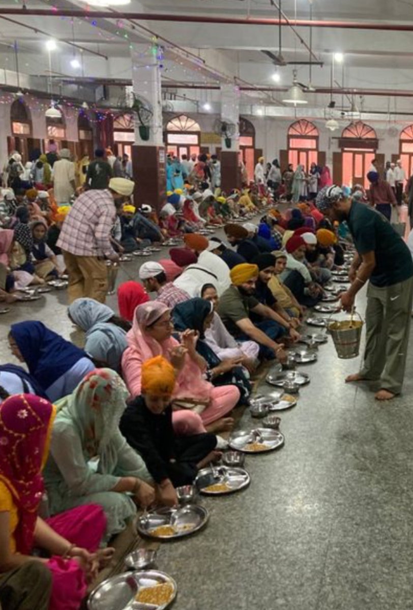 supersikh's tweet photo. @letmego6327 Educate urself communist, they are disinfecting the floor and after that they serve sterilised plates in which the food is served https://t.co/NLq33soGTi