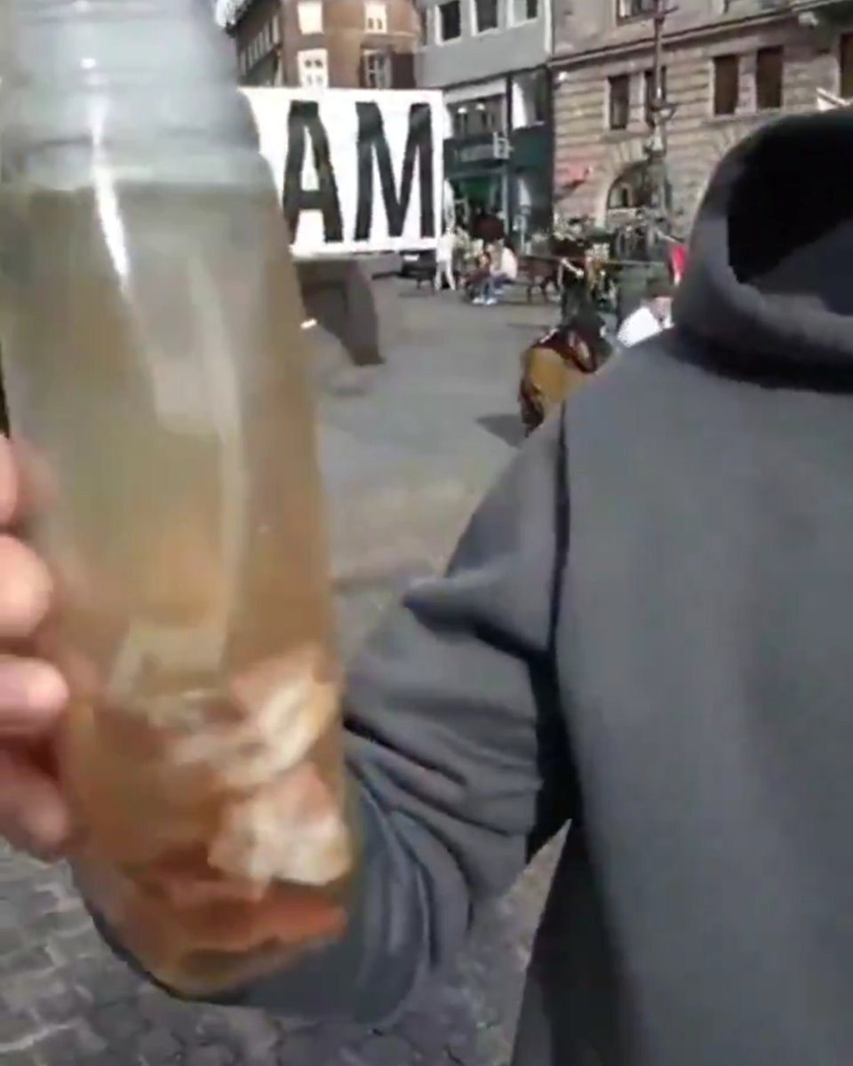 DavidJHarrisJr's tweet photo. 🤣HILARIOUS: A Danish man got fed up with Islamic prayers in a public square and brings a huge sign saying “F*CK ISLAM” and a can of bacon spray to scare off Muslims from coming to pray and taking over the public space. https://t.co/ThbDcWKI7I