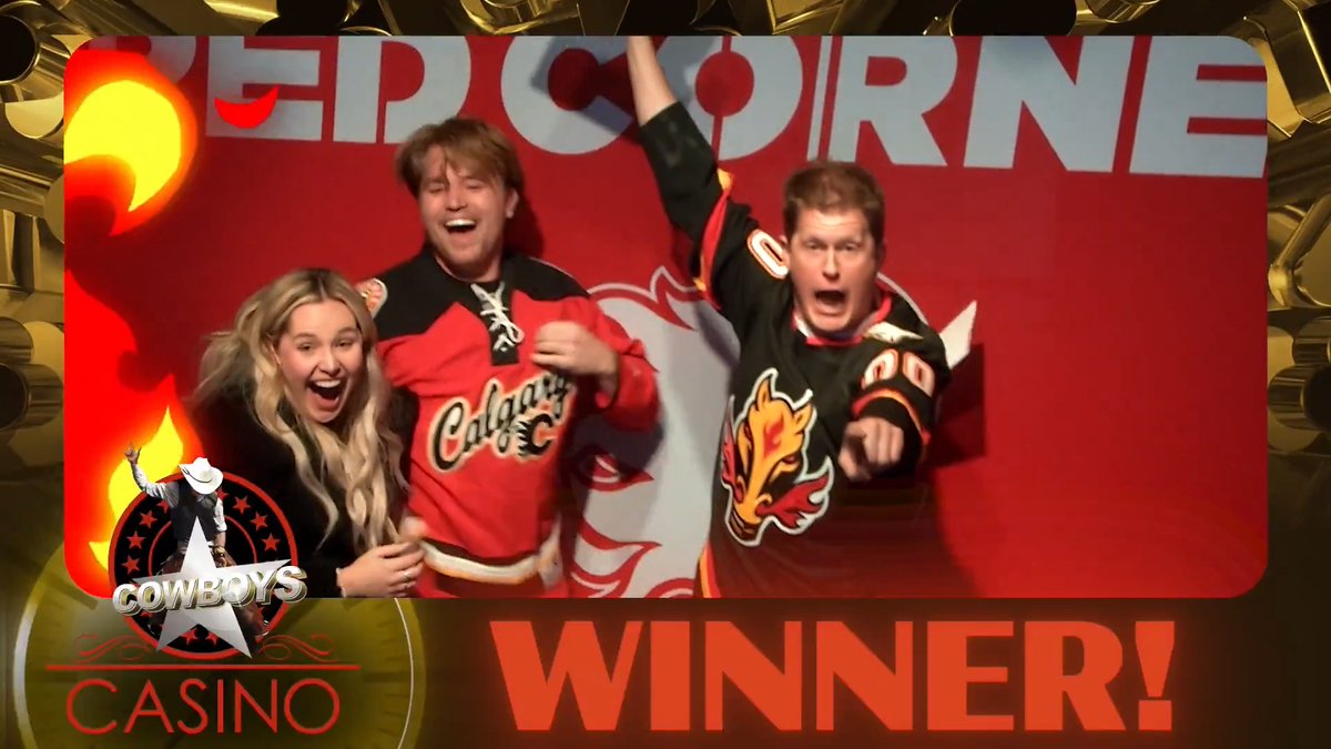 Three excited Calgary Flames hockey fans—one wearing a "Calgary C" jersey and another sporting a #24 jersey—celebrate enthusiastically behind a "POPSCORN" backdrop, with a "WINNER!" banner and Cowboys Casino logo celebrating their contest victory and potential Vegas trip.