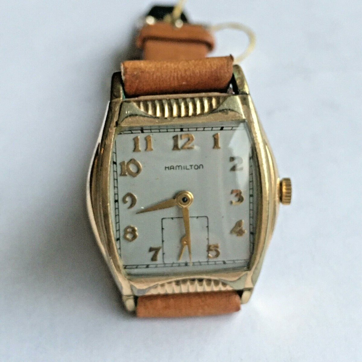 Nobel_Antiques's tweet photo. The Era America Made World Class Wrist Watches:
--Vintage Hamilton Sutton Men's Watch--
Classic 14K Gold Filled cushion case, Arabic numeral dial, manual wind movement, and still running. A handsome American-made mid-century timepiece with timeless style. Ref. Y1925...
#HamiltonWatch #VintageWatch #MensWatch #MidCentury #Wristwatch #WatchCollector #VintageStyle #AmericanMade #Horology #NobelAntiqueJewels