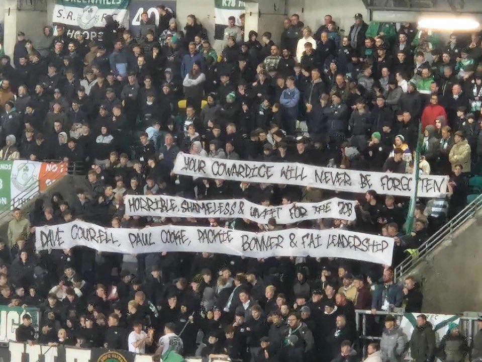 Sport4Palestine's tweet photo. Rovers &amp; Drogheda fans in Tallaght Stadium unfurl banners ‘Your Cowardice Will Never Be Forgotten. Horrible Shameless Unfit For The Job. Dave Courell, Paul Cooke, Packie Bonner &amp; FAI Leadership’ &amp; 1 for Gavin Bazunu ‘Gavin Bazunu We Are With You. Your Bravery Has Made Us Proud’ https://t.co/R3YbD6M9Jd