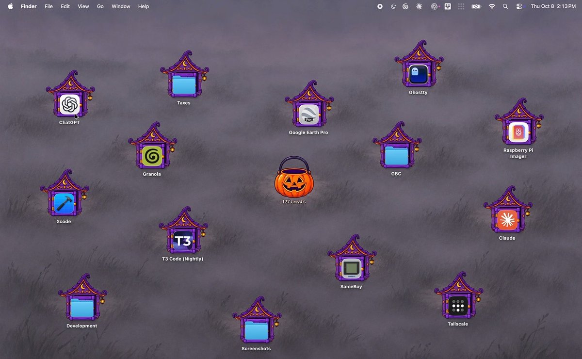 A macOS desktop screenshot dated Thu Oct 8 2:13 PM with a spooky haunted house Halloween theme, displaying folders styled as haunted houses with labels including ChatGPT, Taxes, Google Earth Pro, Ghostly, Raspberry Pi Imager, Granola, GBC, Xcode, Claude, T3 Code (Nightly), SameBoy, 127 treats, Tailscale, Development, and Screenshots.