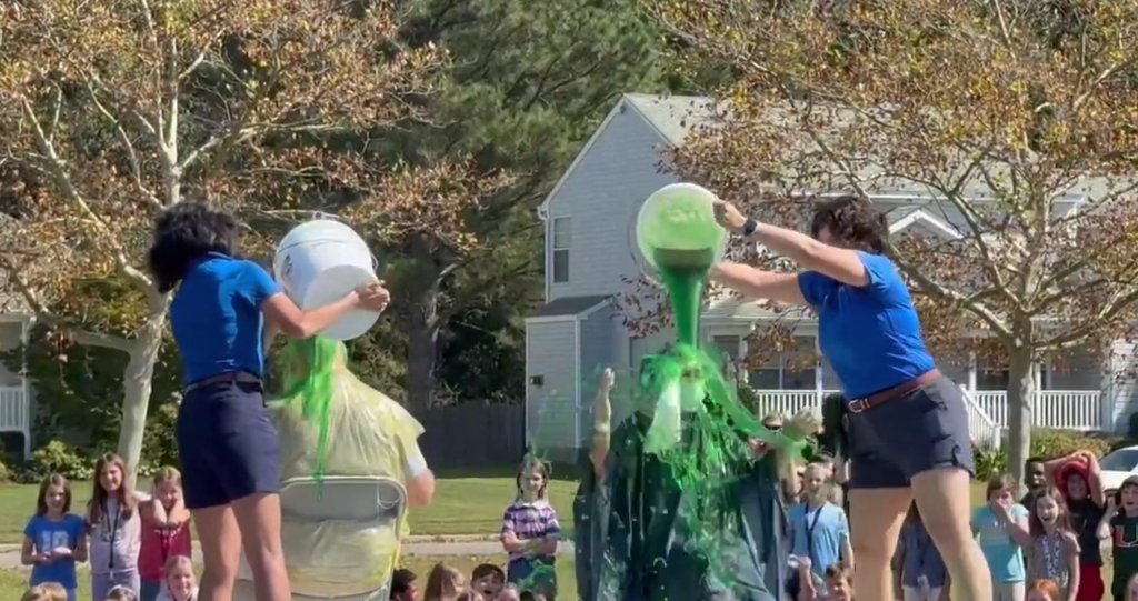 ButtsRoadInt's tweet photo. 🎉 We met our Boosterthon goal, and it was time to celebrate! 🎉 Our students earned the ultimate reward! They slimed our principal, Mr. Connolly, and assistant principal, Dr. Sweeney! 🪣😂 Great job working together and reaching our fundraising goal! 🎉 https://t.co/F4hSCCHHIF