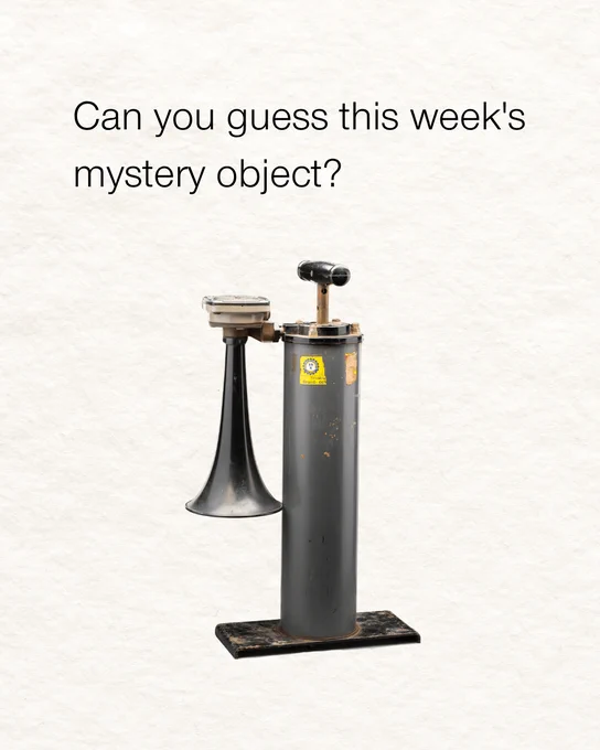 Image of a long cylindrical shape. A horn is connected to one side, with a small knob sticking out of the top. Overlay text reads 'Can you guess this week's mystery object?'