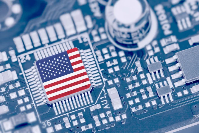 Digital illustration of a U.S. flag on a processor