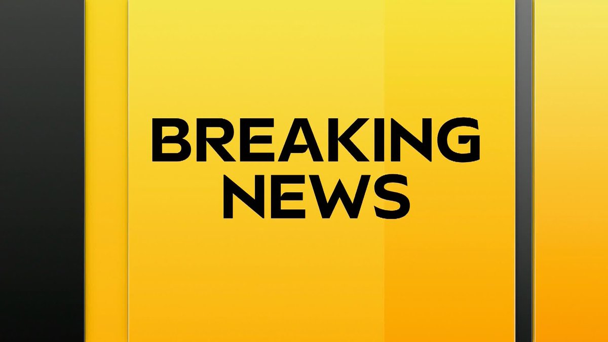 A bold yellow graphic displays the words 'BREAKING NEWS' in large black letters.
