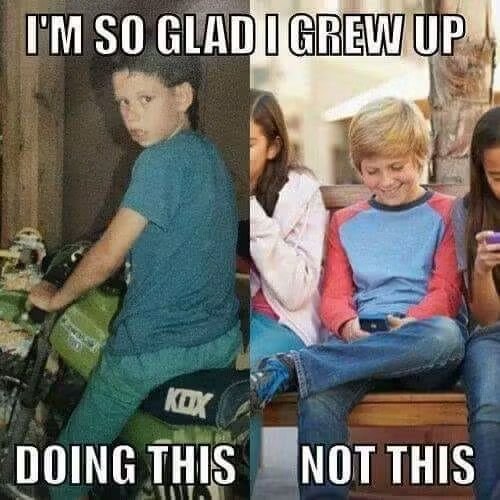 The image is a meme comparing childhood activities, showing a boy riding a dirt bike on the left under the text "I'M SO GLAD I GREW UP DOING THIS," while on the right, kids stare at their phones under "NOT THIS." The accompanying "Yup." comment expresses agreement, reinforcing the meme's nostalgic message that the poster prefers active, outdoor play over passive phone use among today's youth.