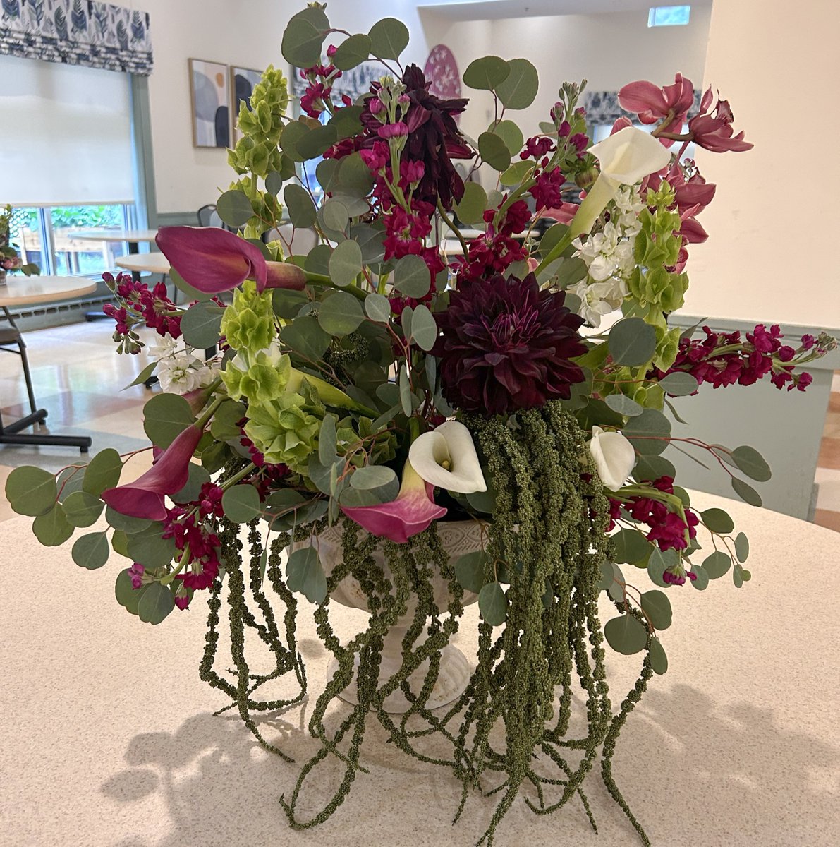 RosiesPlace's tweet photo. Decadent dahlias and colorful calla lilies make for gorgeous centerpieces in our Dining Room! We are so grateful to our generous donors for providing these beautiful arrangements! https://t.co/Z5pHe9Y6ay