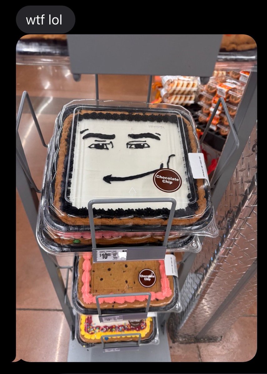Sneegsnag's tweet photo. My wife just found the cake of all time at our Walmart https://t.co/Gc6oYK89d6