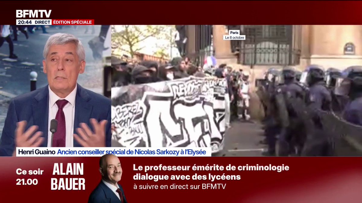 A BFMTV broadcast features Henri Guaino, former special advisor to Nicolas Sarkozy, during a 'Direct Édition Spéciale' discussing protests in Paris on October 8th, with an upcoming interview by professor of criminology Alain Bauer advertised below.